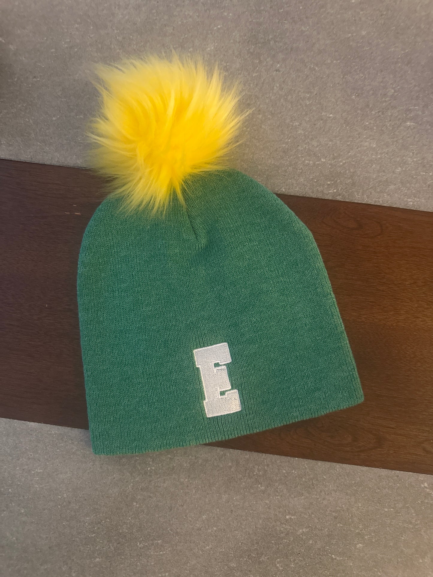 Green hat w yellow Pom